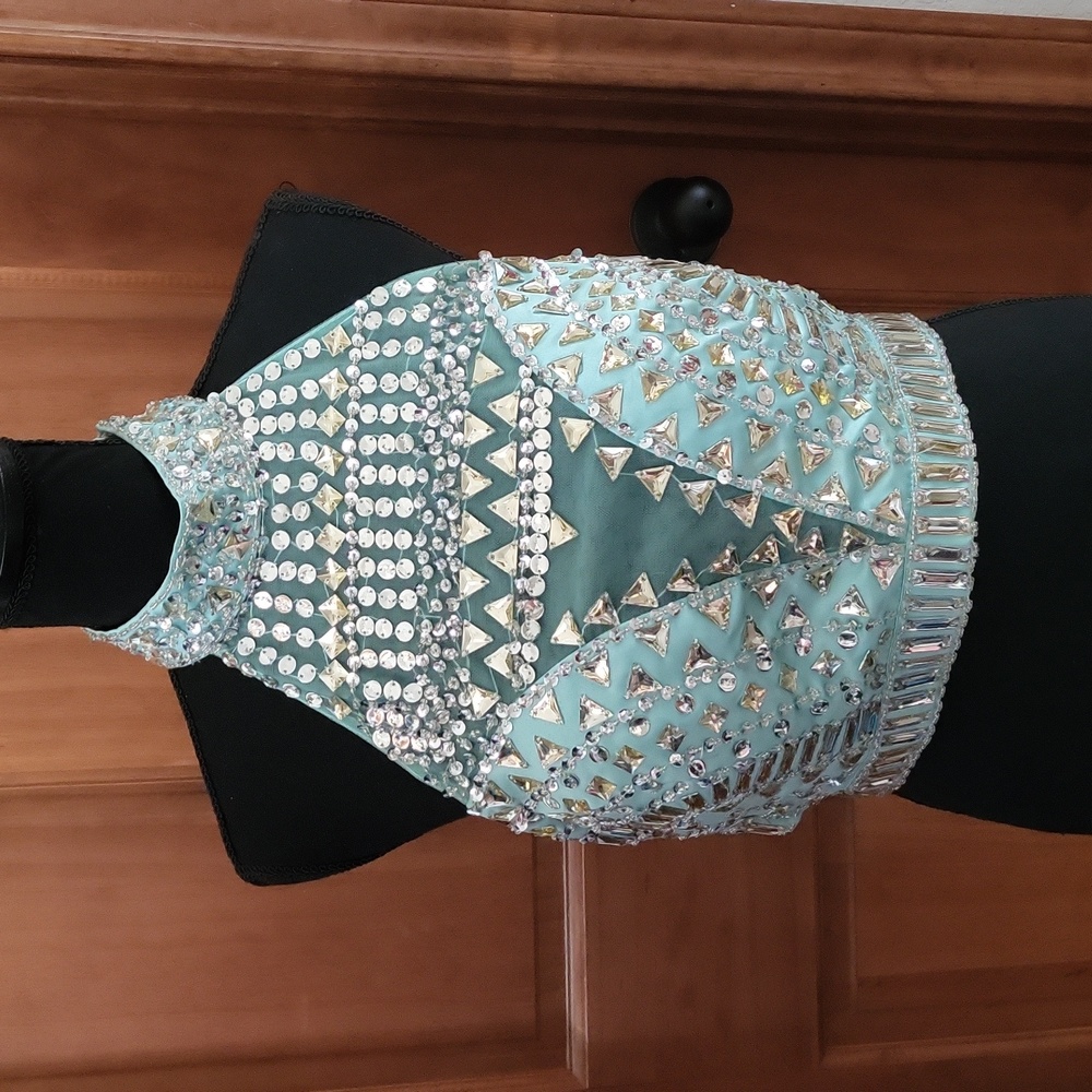 Green jeweled  top with mesh see thru front.
